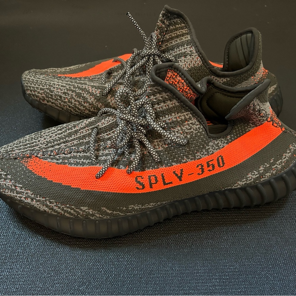Adidas Yeezy Boost 350 V2 Sneakers.
Does not come with shoe box.